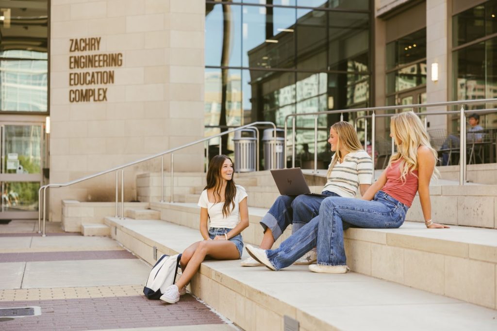 Texas A&M students hanging out together on TAMU campus
