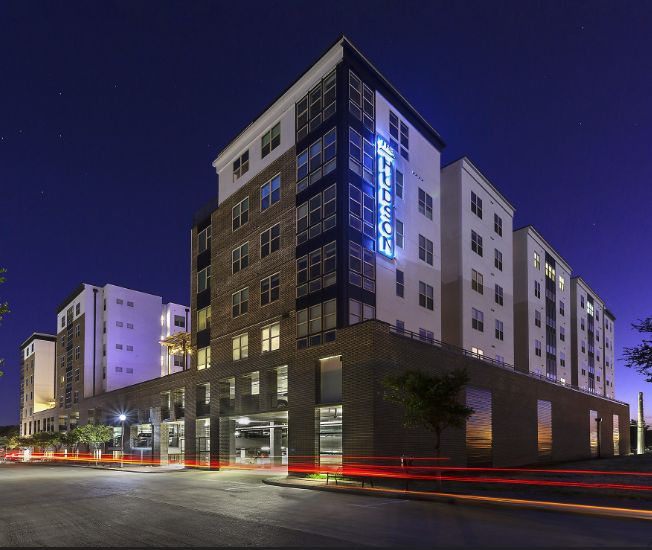 Nighttime view of The Hudson in College Station.