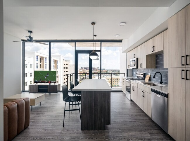 Kitchen and living area inside units at Otto Northgate in College Station.