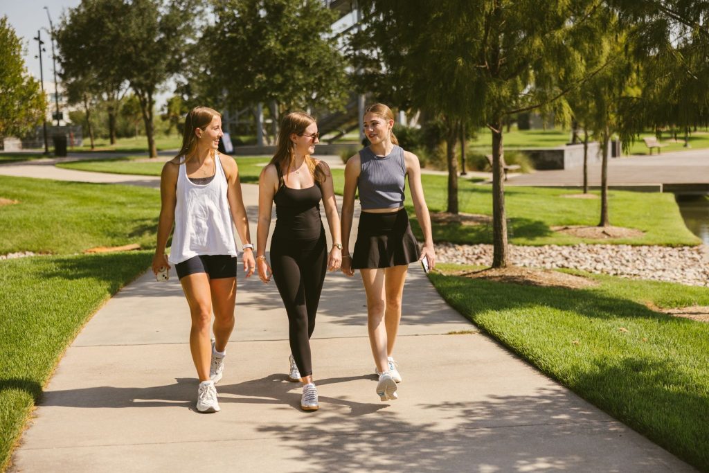 Texas A&M students walk outside in College Station.