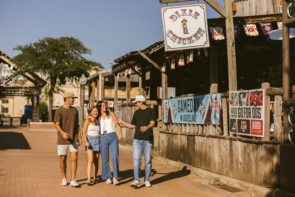 Texas A&M students walk through Northgate in College Station.