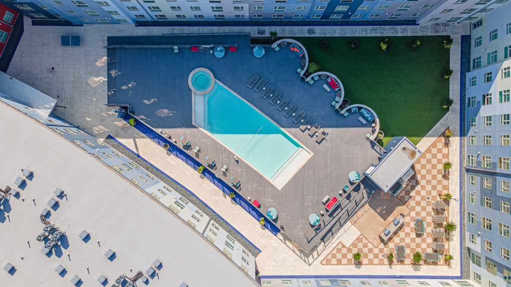 Pool courtyard at The Stack off-campus housing in College Station.