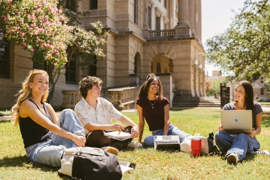 Texas A&M students study on campus outside in College Station.