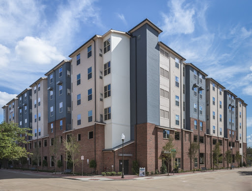 Daytime exterior view of Cherry Street Apartments in College Station.
