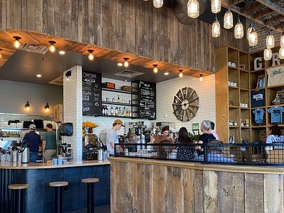 Wood textures, black hardware accents and a white tile backsplash pull together Koppe Bridge Bar & Grille located near Eastgate.