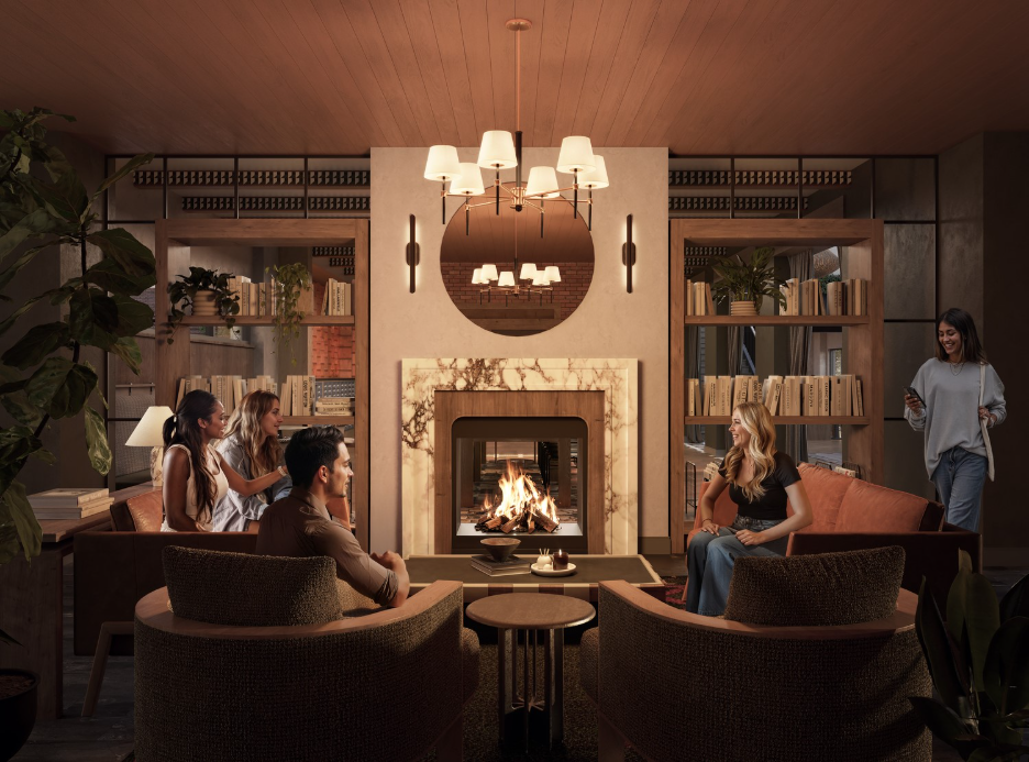 Interior common area at The Jay complete with a fireplace and elevated furnishings. 