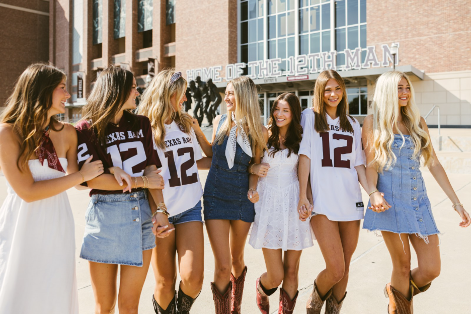 A group of Texas A&M students walk around the stadium in College Station.