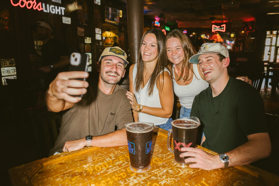 Texas A&M students enjoy happy hour off campus in College Station.