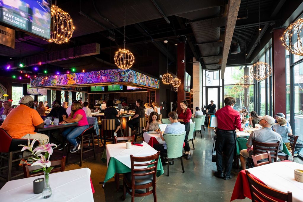 Juanita’s has a vibrant interior with high-top, bar and regular seating for groups of varying sizes.