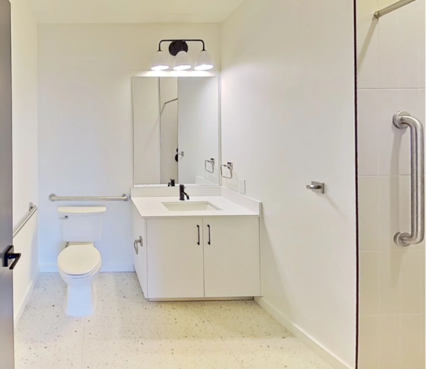 Accessible bathrooms at The Jay come with grab bars for increased accessibility around the space.