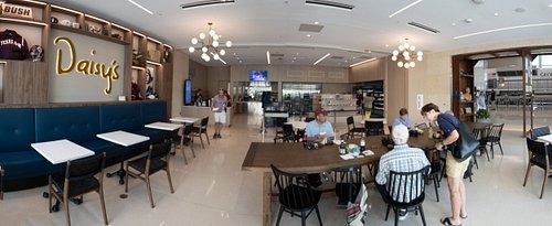 Booth and Table seating available in the open concept space at Daisy’s Table brunch spot in College Station.