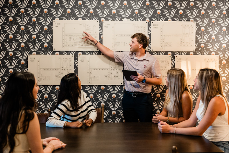Texas A&M students take a tour of The Jay at the new leasing office. 